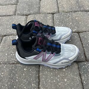 New Balance Black and Purple Trail Shoes